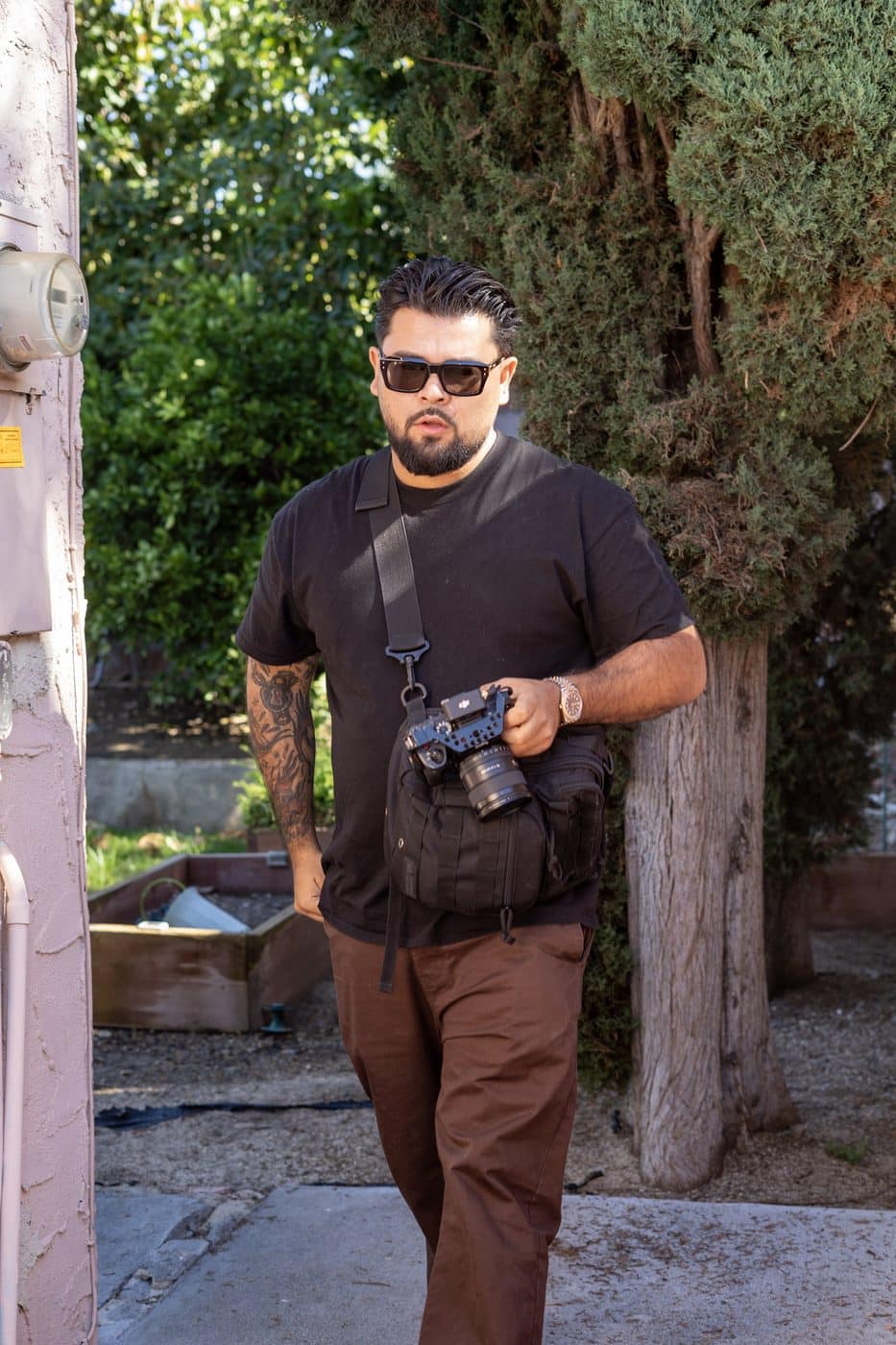 Jonathan on a residential job site with his camera rig